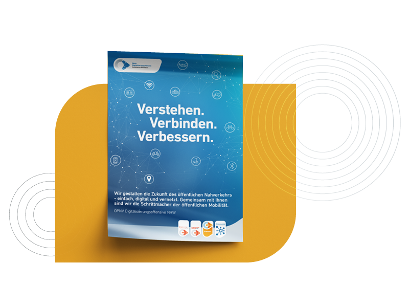 Smartphone mit dem Schriftzug „Vernetzen. Verbinden. Verbessern.“ als Motiv der Digitalisierungsoffensive.